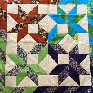 Hand crafted Decretive multi colored Quilt